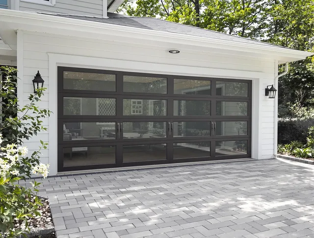 Tamiami Garage Door Repair design specialist presenting custom garage door options to Tamiami homeowner