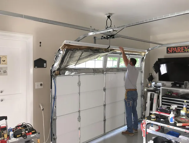 Garage door section replacement by Tamiami Garage Door Repair in Tamiami