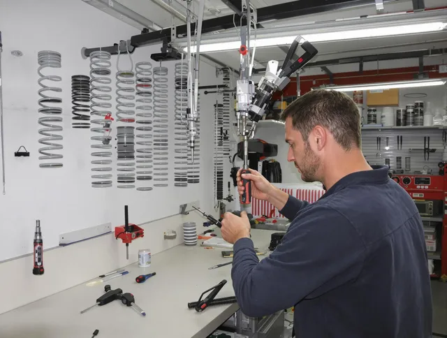Tamiami Garage Door Repair safety certified technician performing precision spring replacement in Tamiami