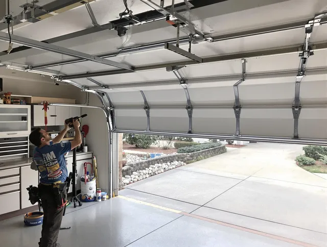 Garage door track repair service by Tamiami Garage Door Repair in Tamiami